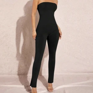 Jumpsuit  - Storlek Xs men stretchig passar S med använd 1 gång ,nyskick 