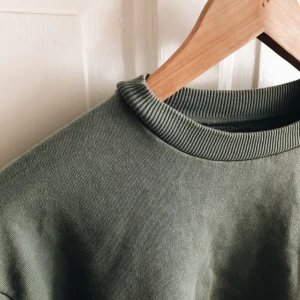  - Tjocktröja från NA-KD. Fin grön färg.  Frakt tillkommer :)