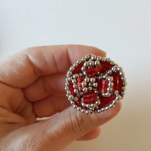  - Söt ring köpt utomlands. Ser ut som en ros.  Handgjord.