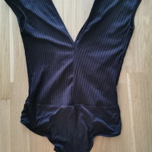 Body  - Sjukt snygg body som passar både en s eller m. 