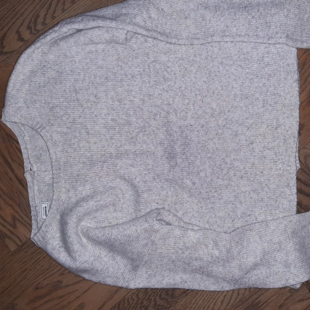 very cute sweat which is unfortunately a little bit too small for me. the color is beige, and grey mixed together.. Hoodies.