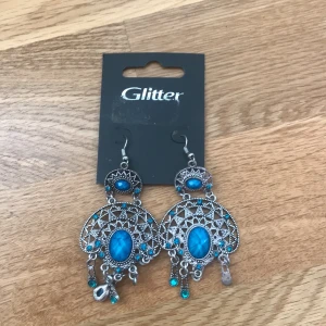 Örhängen - Örhängen från Glitter. Kan skicka, köpare står för frakt.