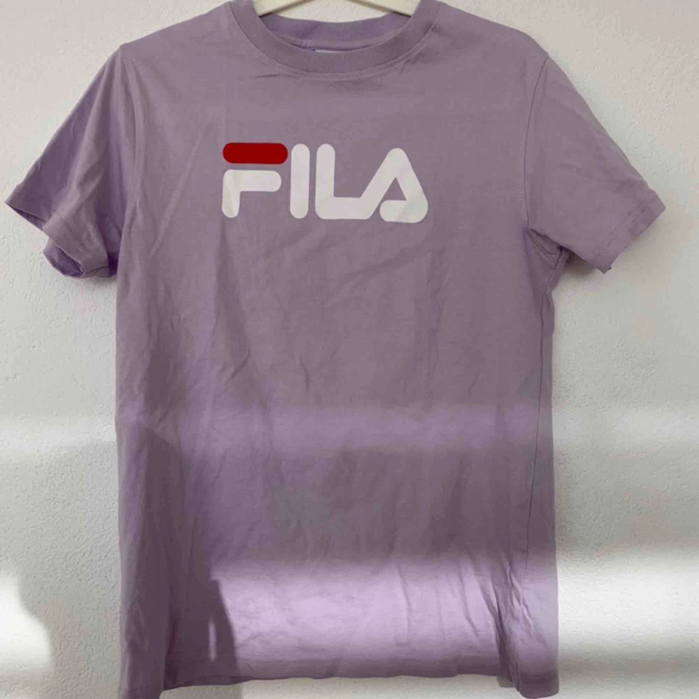 Lavender Fila shirt ! Never worn ✨ meet in Stockholm or pay for shipping 💞. T-shirts.