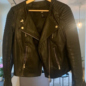 Skinnjacka - 100% läder