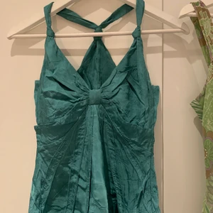 Grönt linne - Coolt grönt/turkost linne från sand copenhagen. Priset är inklusive frakt, möts inte upp:)