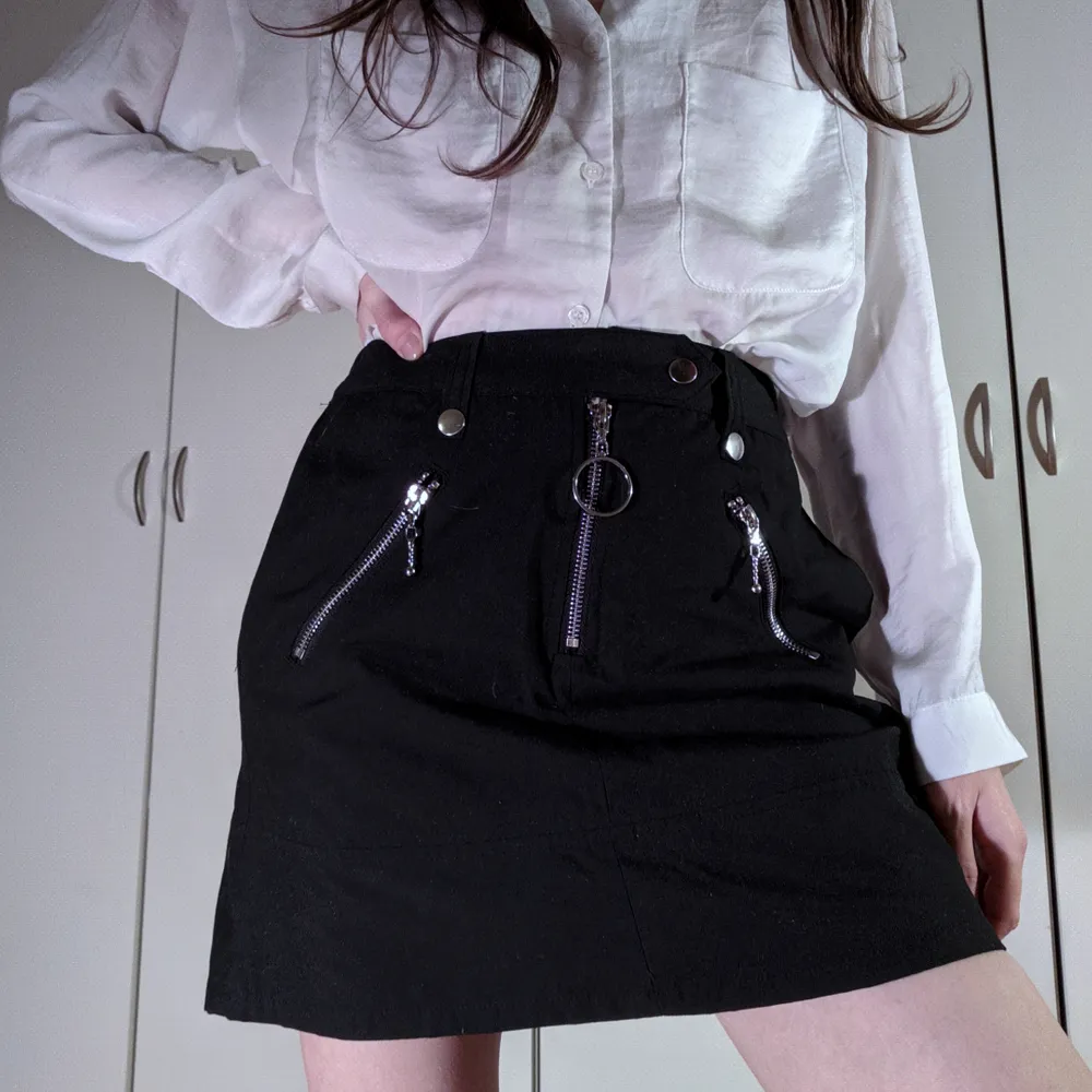 Kort kjol från Wego i Tokyo. Storlek XS-S.  Aldrig använd  Har inbyggda