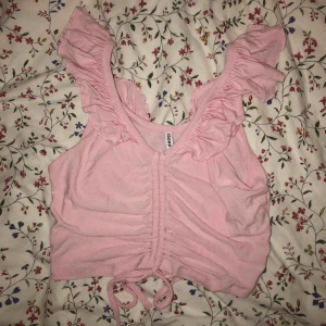  - Två toppar i storlek xs 