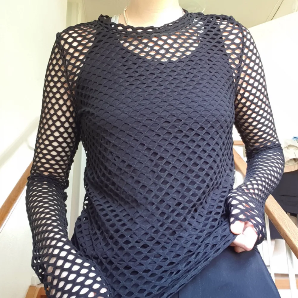 Världens coolaste fishnet-tröja i strlk S. Svart, långärmad, 