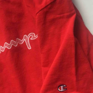  - Champion t-shirt , sitter som XS 