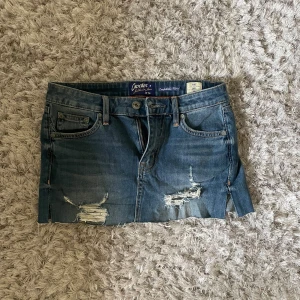 Lågmidjad jeanskjol från Crocker - Midjemått 36cm!