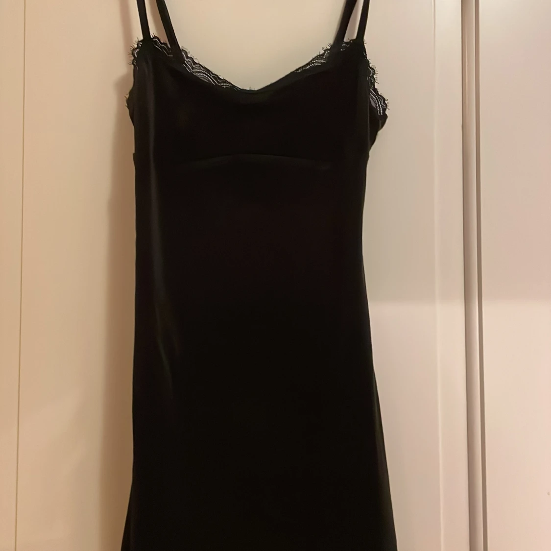 Svart klänning med spets från H&M Divided