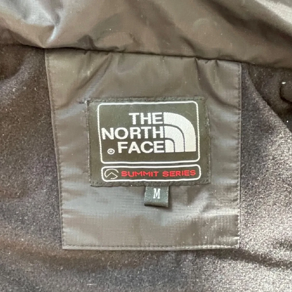 Svart vindjacka från The North Face Summit Series - 2