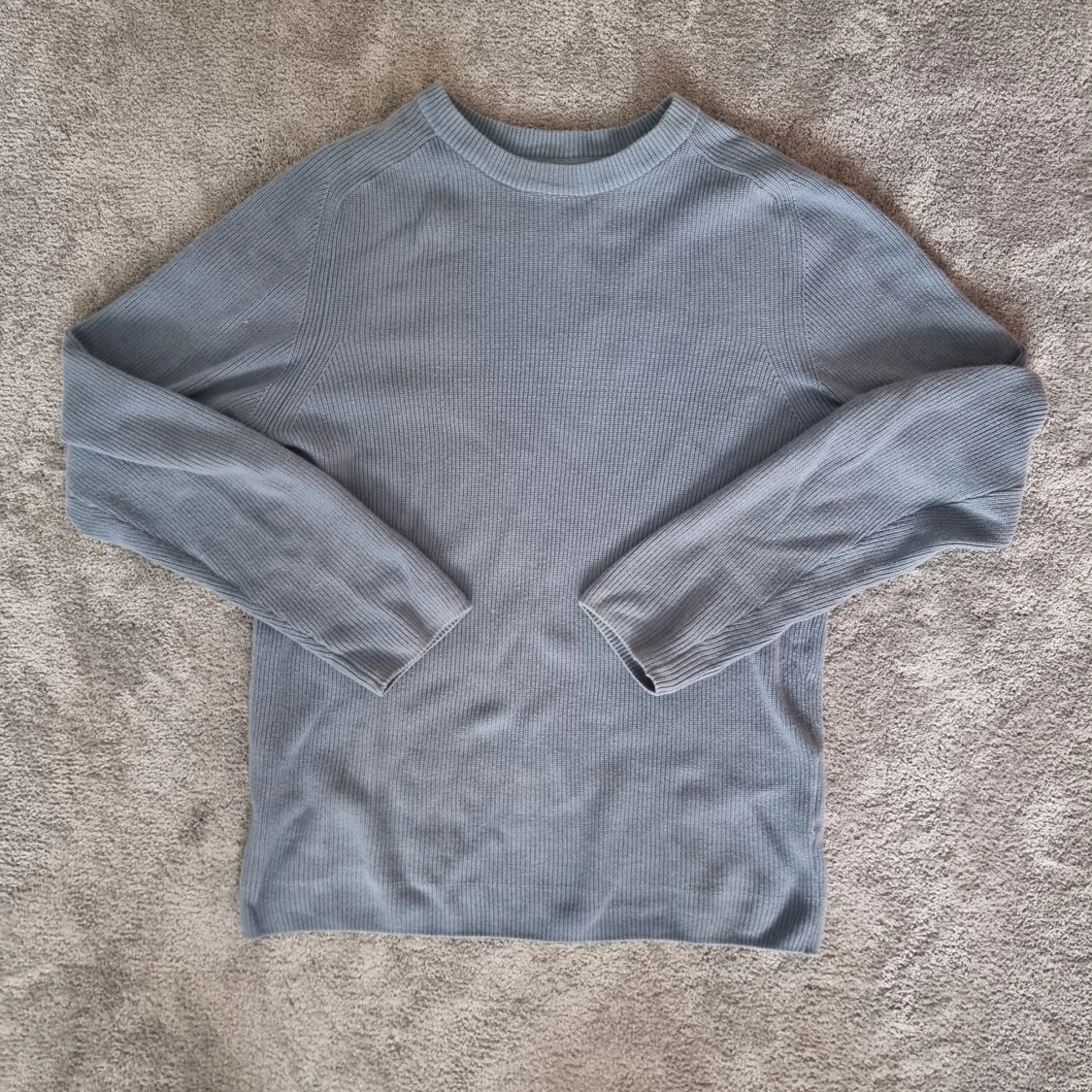 Blå stickad tröja från FSBN