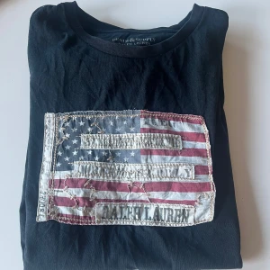  Ralph Lauren T-shirt - Säljer en svart t-shirt från Ralph Lauren i strl M