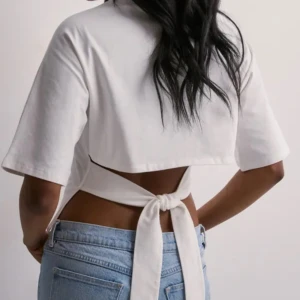 OPEN BACK TIE TEE  - Ny och oanvänd OPEN BACK TIE TEE från Nelly.com i storlek XS 