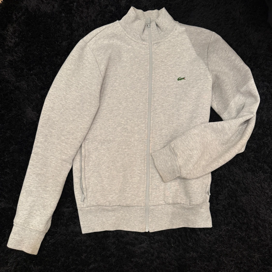 Grå ziptröja från Lacoste - 1