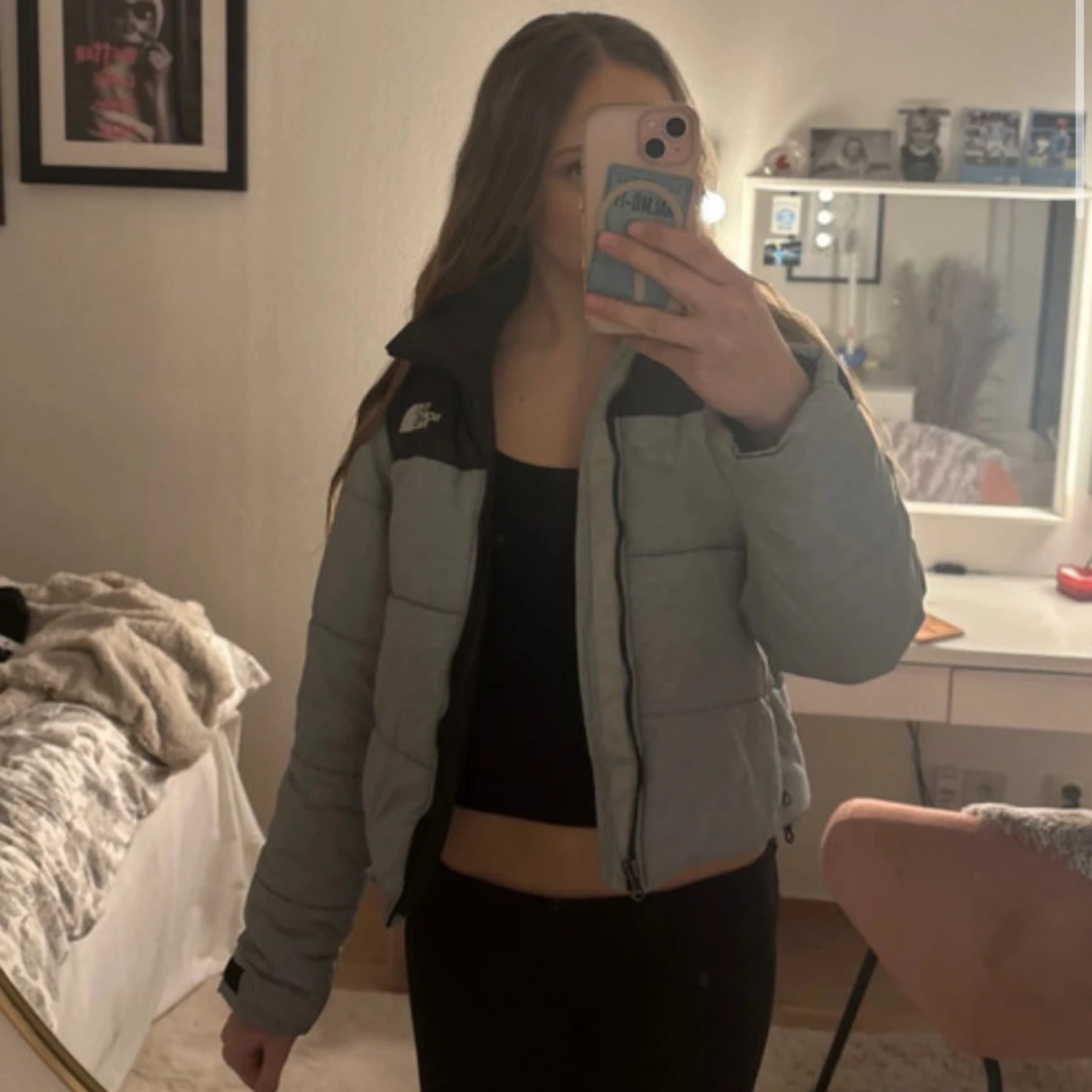 Grå pufferjacka från The North Face XS