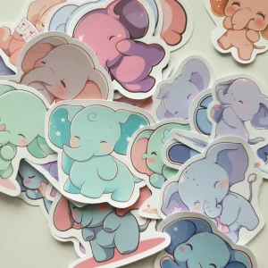 24st Söta Elefanter Klistermärken/stickers  - En charmig klistermärken med färgglada och gulliga elefanter i olika stilar. Perfekt för att dekorera anteckningsböcker, laptops eller skapa egna konstprojekt. Passar dig som älskar söta djur och vill sätta en personlig touch på dina saker.