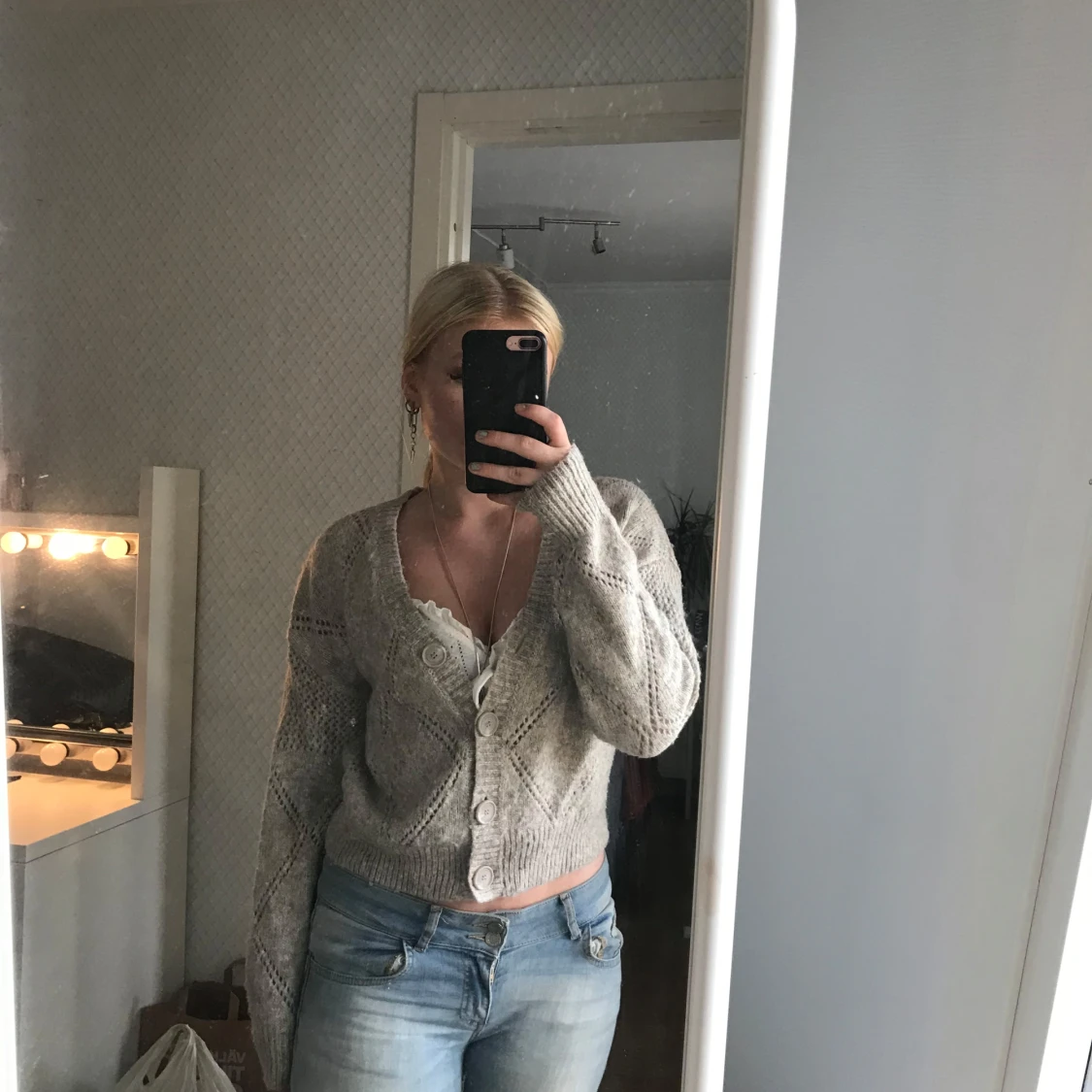 Grå stickad kofta från KappAhl