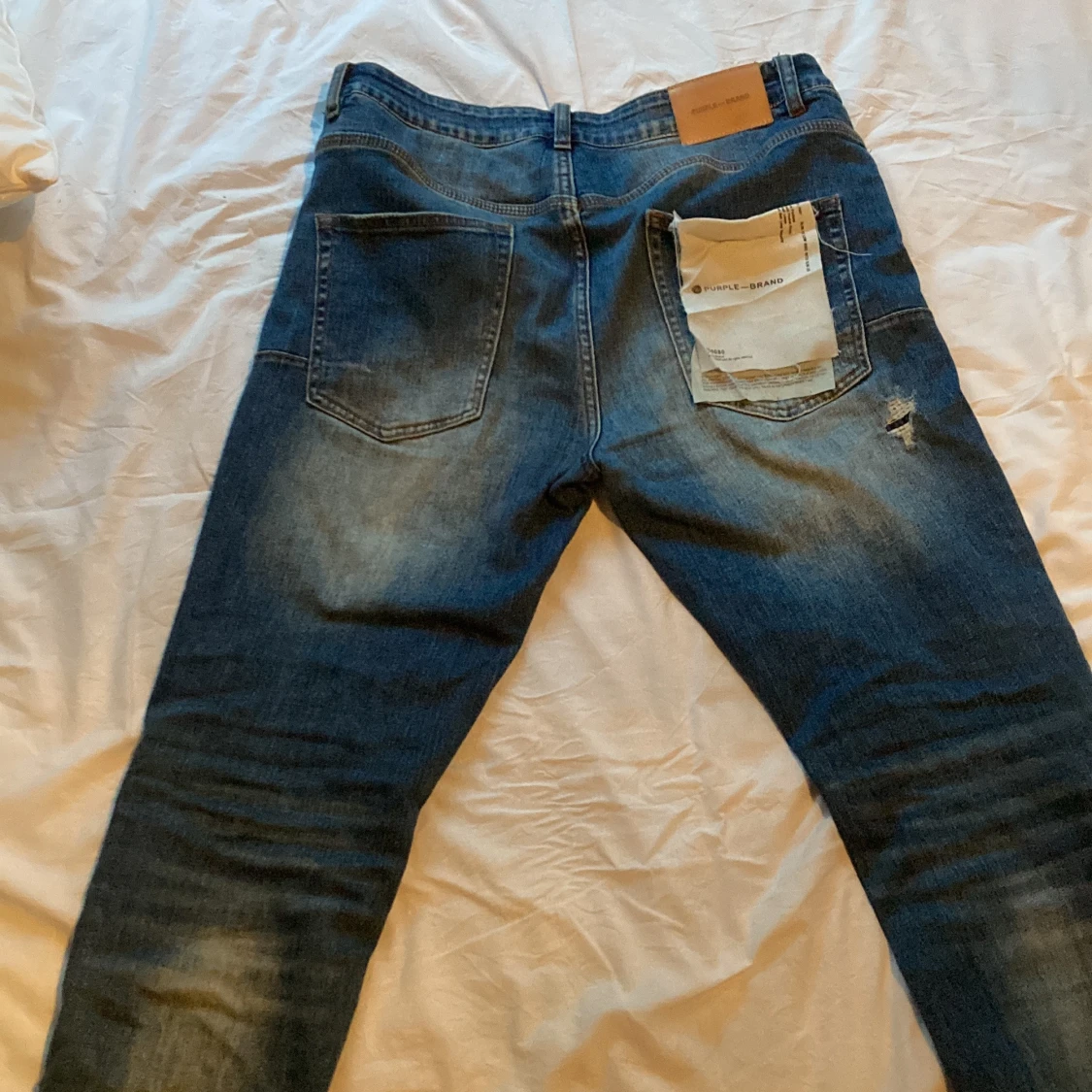 Blå distressed jeans från Purple Brand - 1