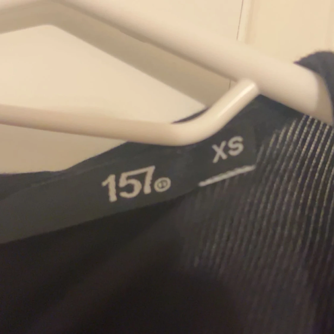 Svart kofta med knytband från 157 - 2