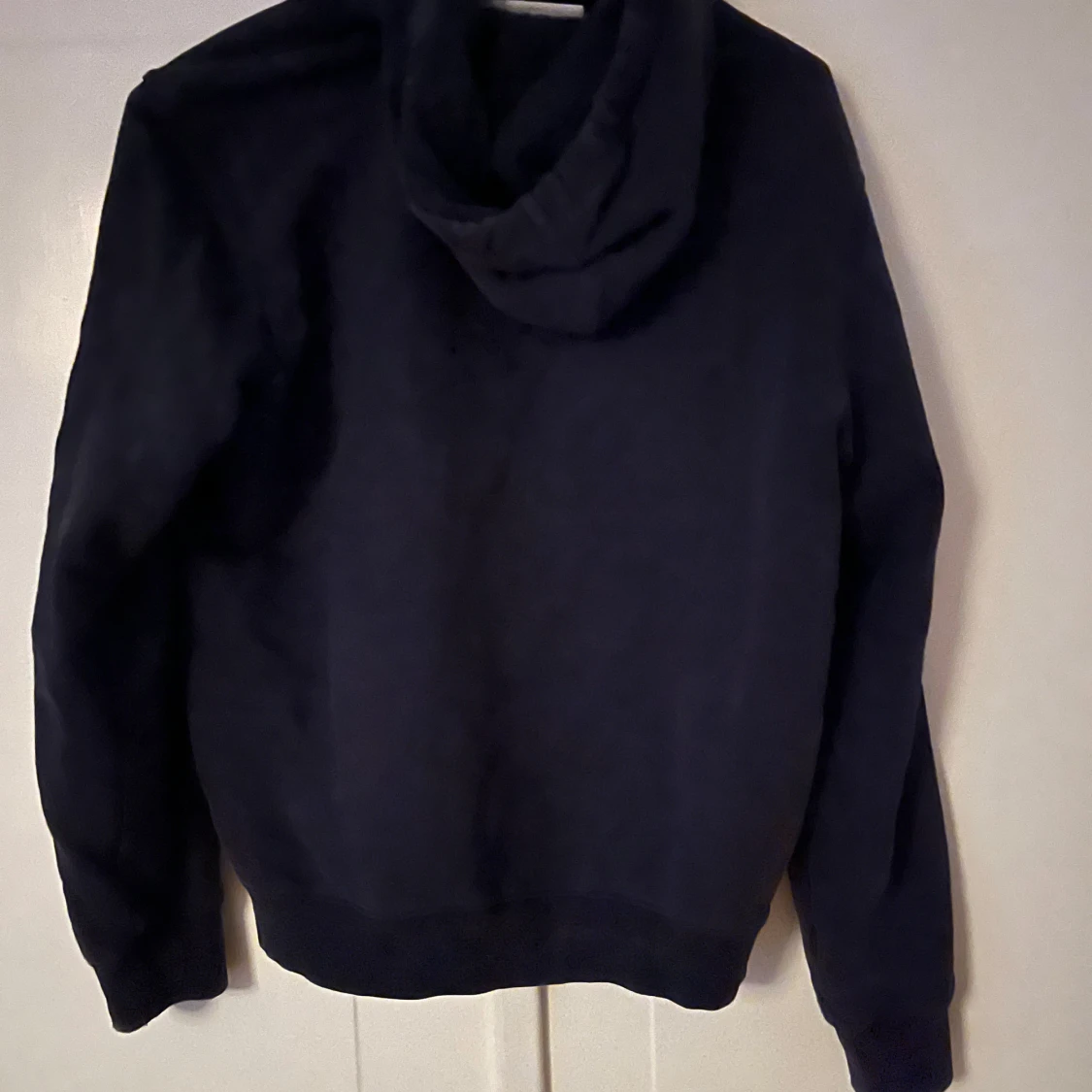 Mörkblå hoodie från Lacoste - 1