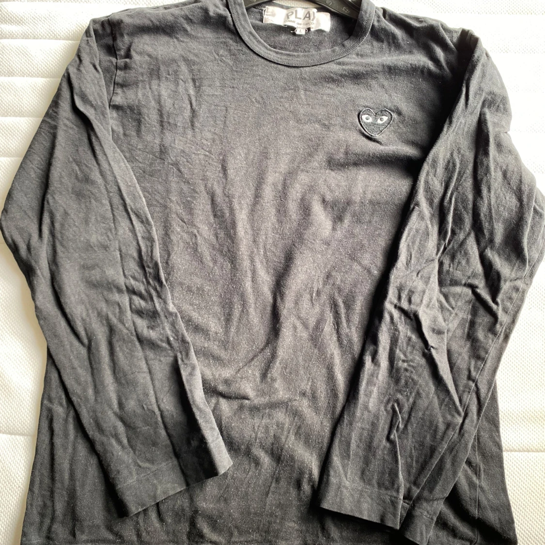 Svart långärmad tröja från Comme des Garçons