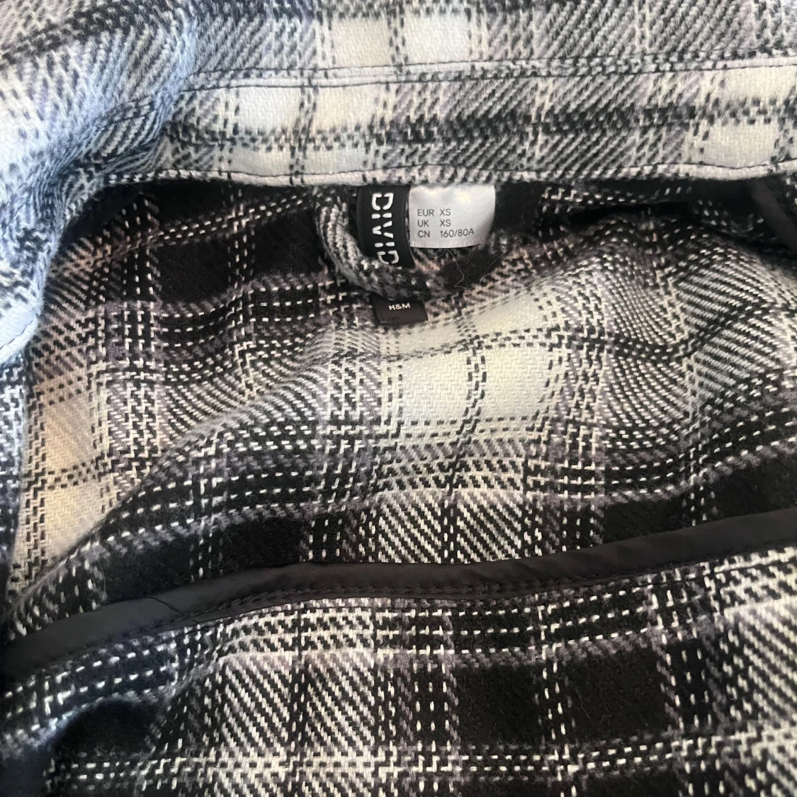 Svart och vit rutig overshirt från Divided
