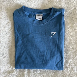 Gymshark tröja - Blå gymshark t-shirt, storlek S. Endast använd en gång. Köparen står för frakten!