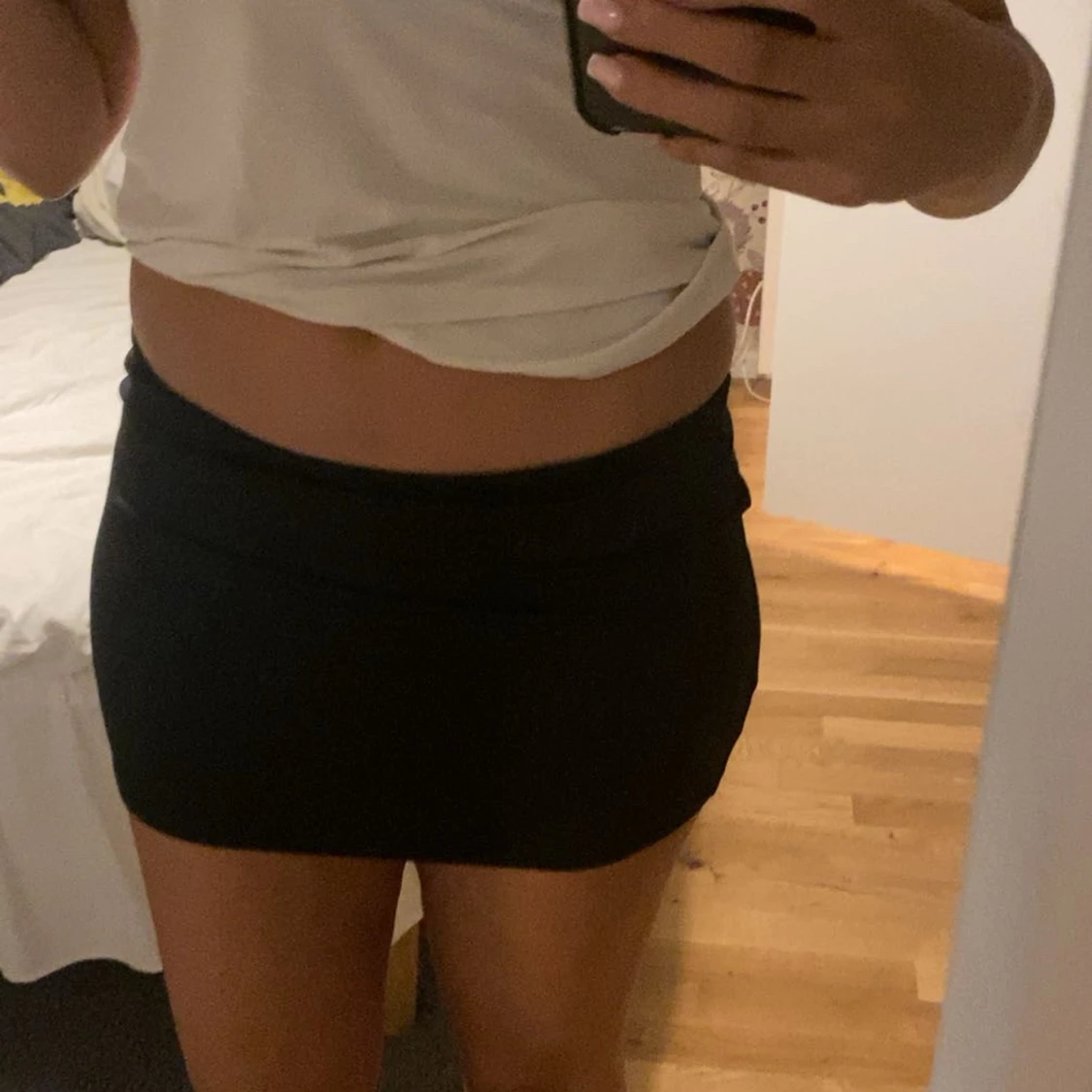 Svart tight minikjol