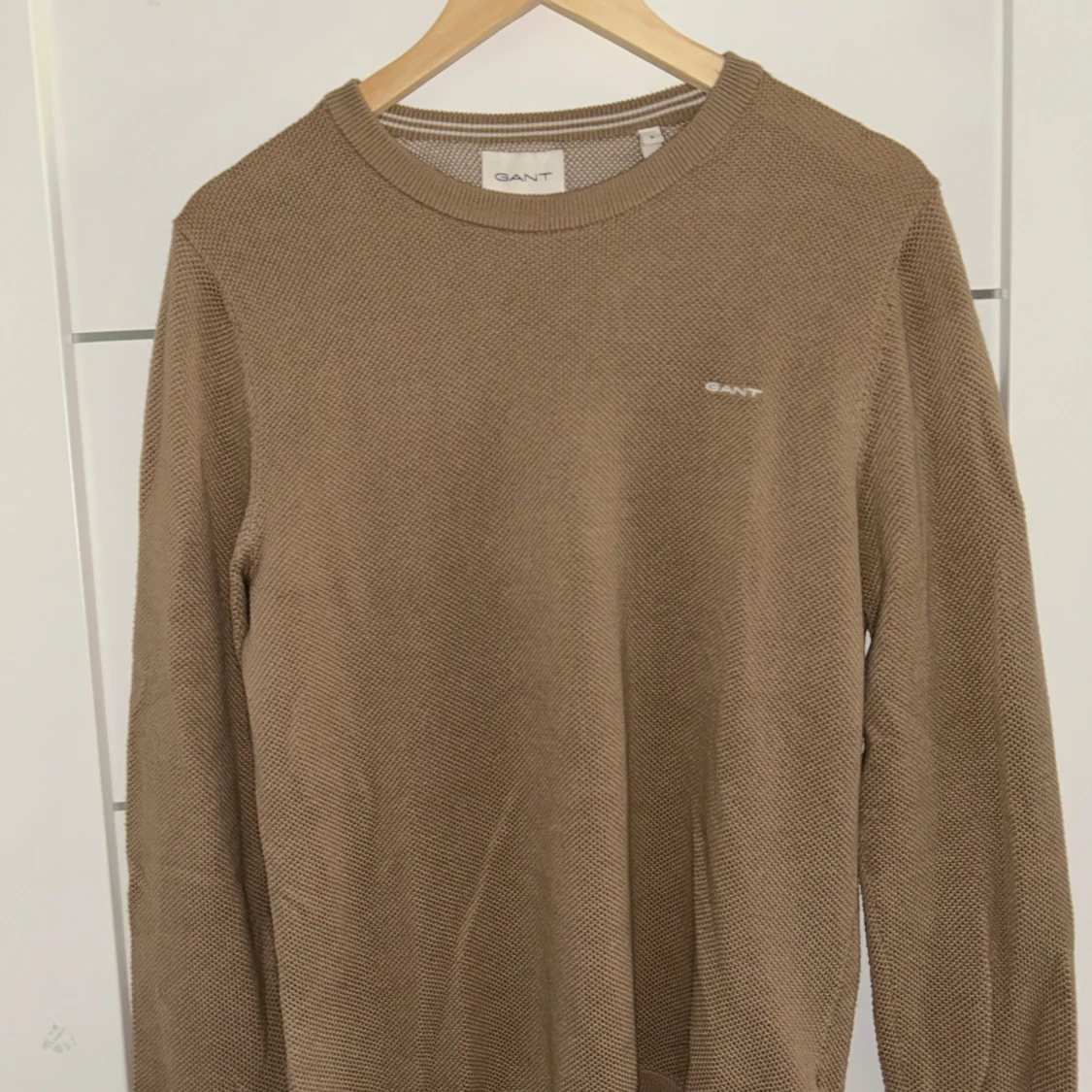Beige stickad tröja från GANT