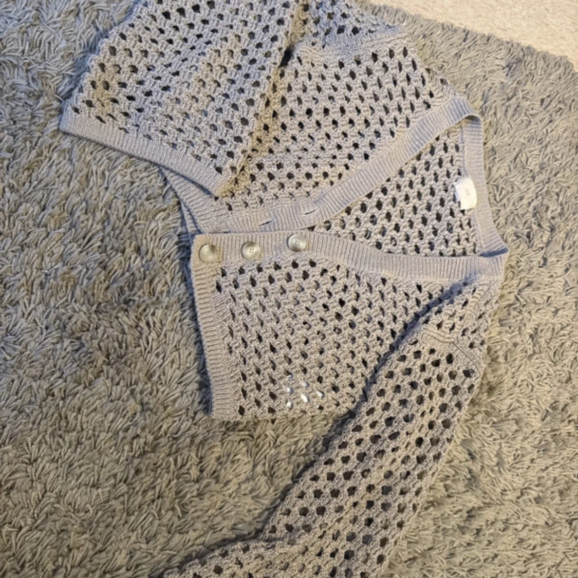 Beige stickad kofta från HM