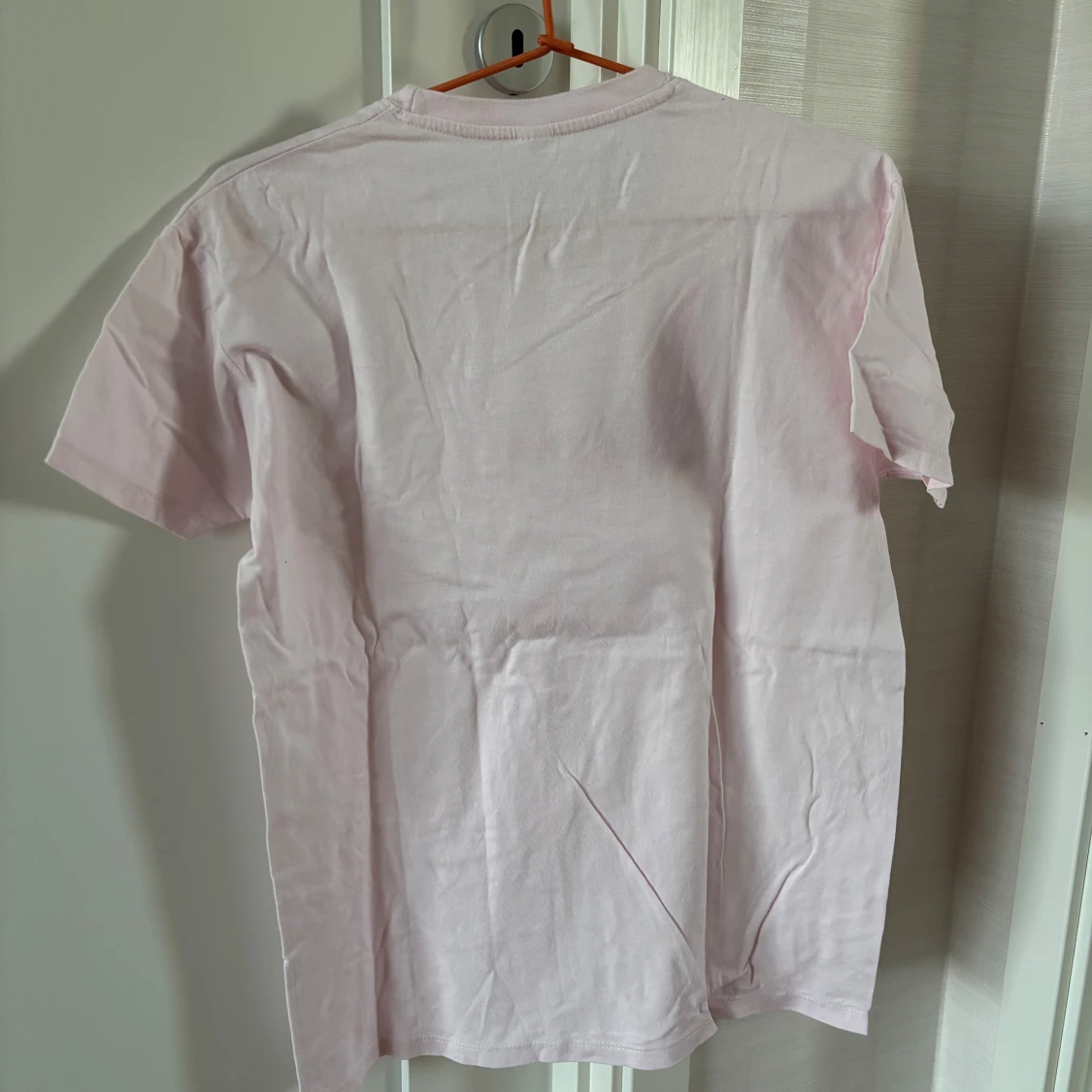 Ljusrosa t-shirt med tryck - 1