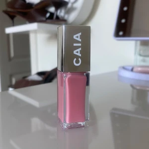 CAIA Pinky Promise läppglans - Säljer ett CAIA läppglans i färgen Pinky Promise. Limited edition från påskägget 