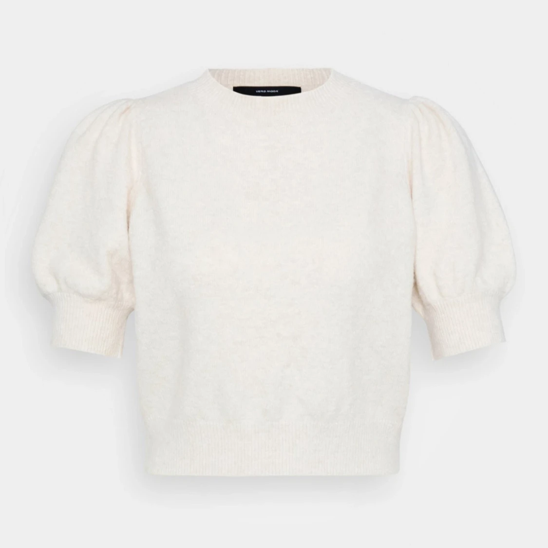 Vit stickad tröja med puffärm