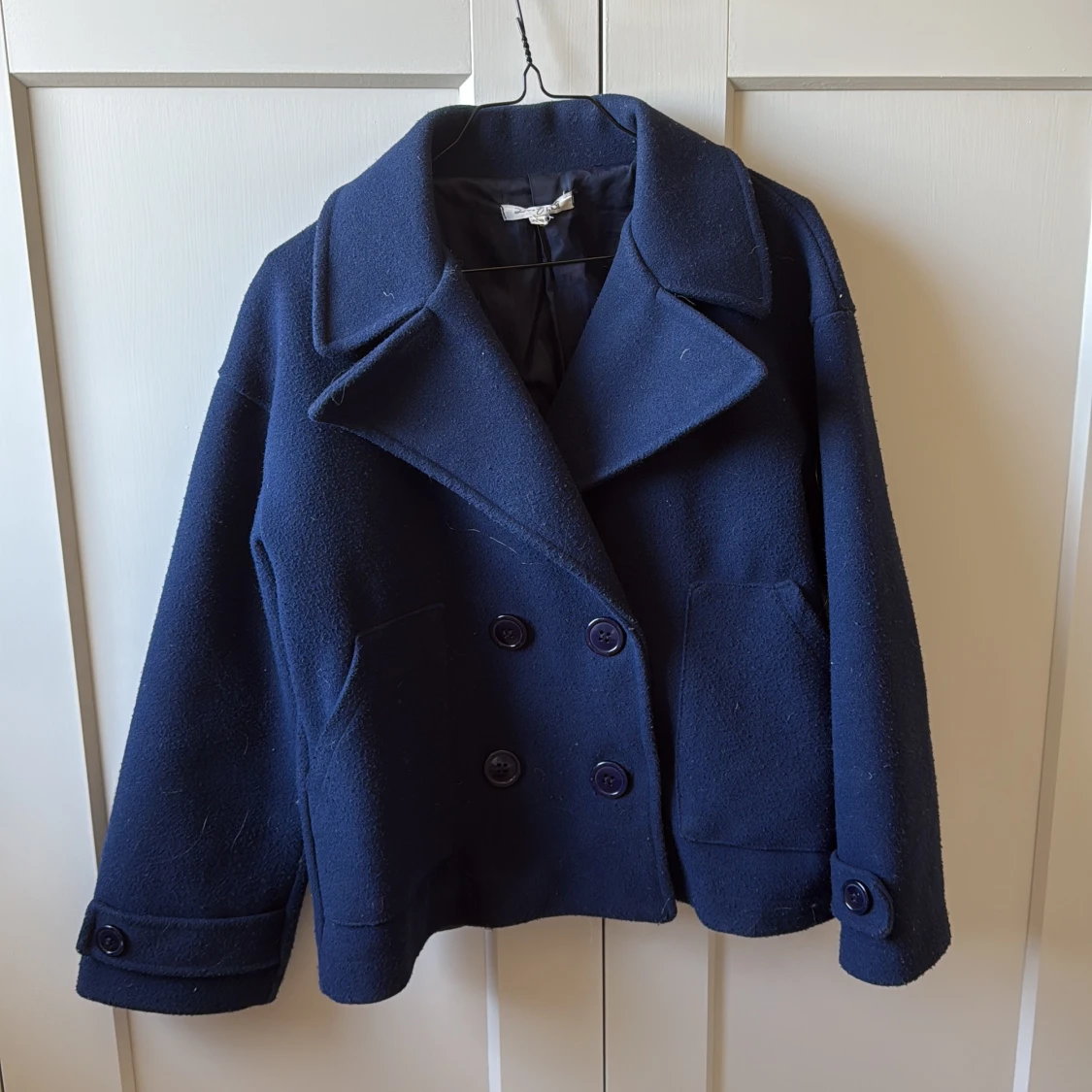 Mörkblå kappa från design by si st xs/s