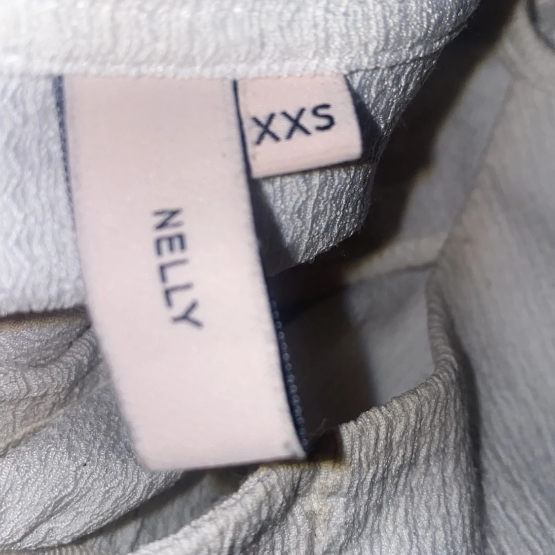 Vit ribbad linnetopp från Nelly - 3