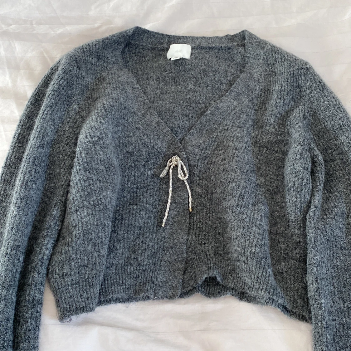 Kofta med silverdetalj från hm