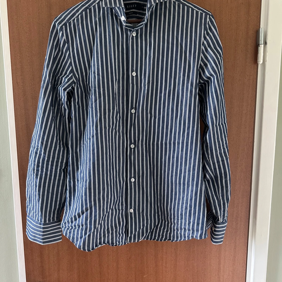 Randig blå skjorta från Riley