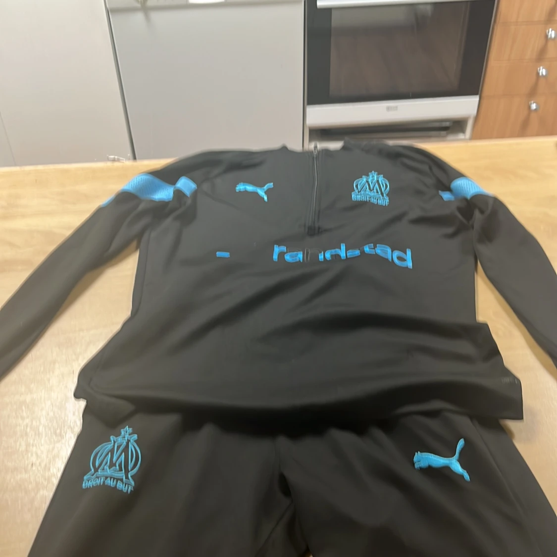 Svart Puma Marseille half zip träningströja
