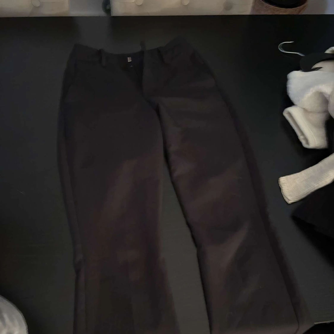 Svarta kostymbyxor med raka ben