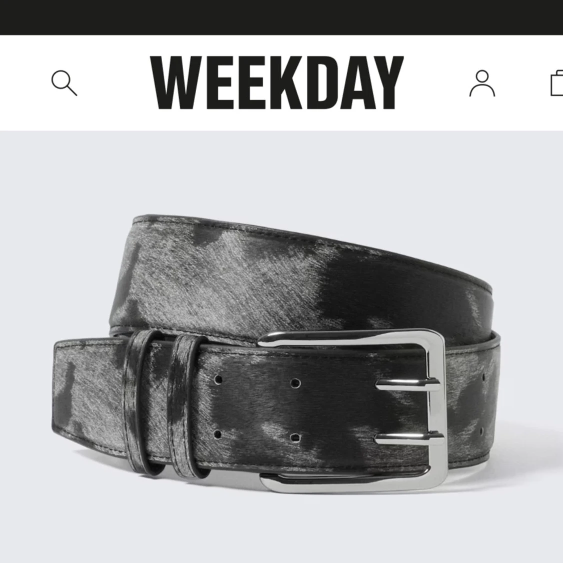 Svart och grått bälte med mönster