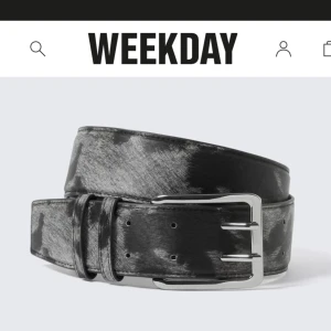 Svart och grått bälte med mönster - Snyggt bälte från weekday i svart och grått. Nästan aldrig använd.