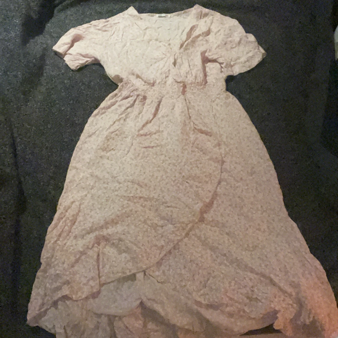 Ljusrosa blommig klänning