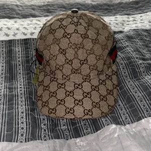 Gucci keps  - Gucci keps jätte fin helt ny!