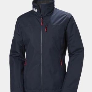Marinblå vindjacka från Helly Hansen - Snygg marinblå vindjacka från Helly Hansen med hög krage, sportig design som funkar till det mesta. Nästan helt oanvänd😊kan släppa den för 25€