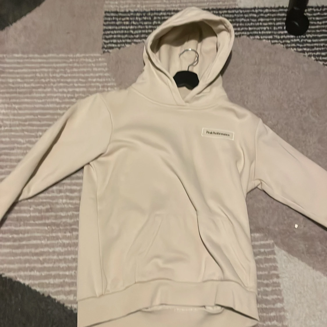 Beige hoodie från Peak Performance