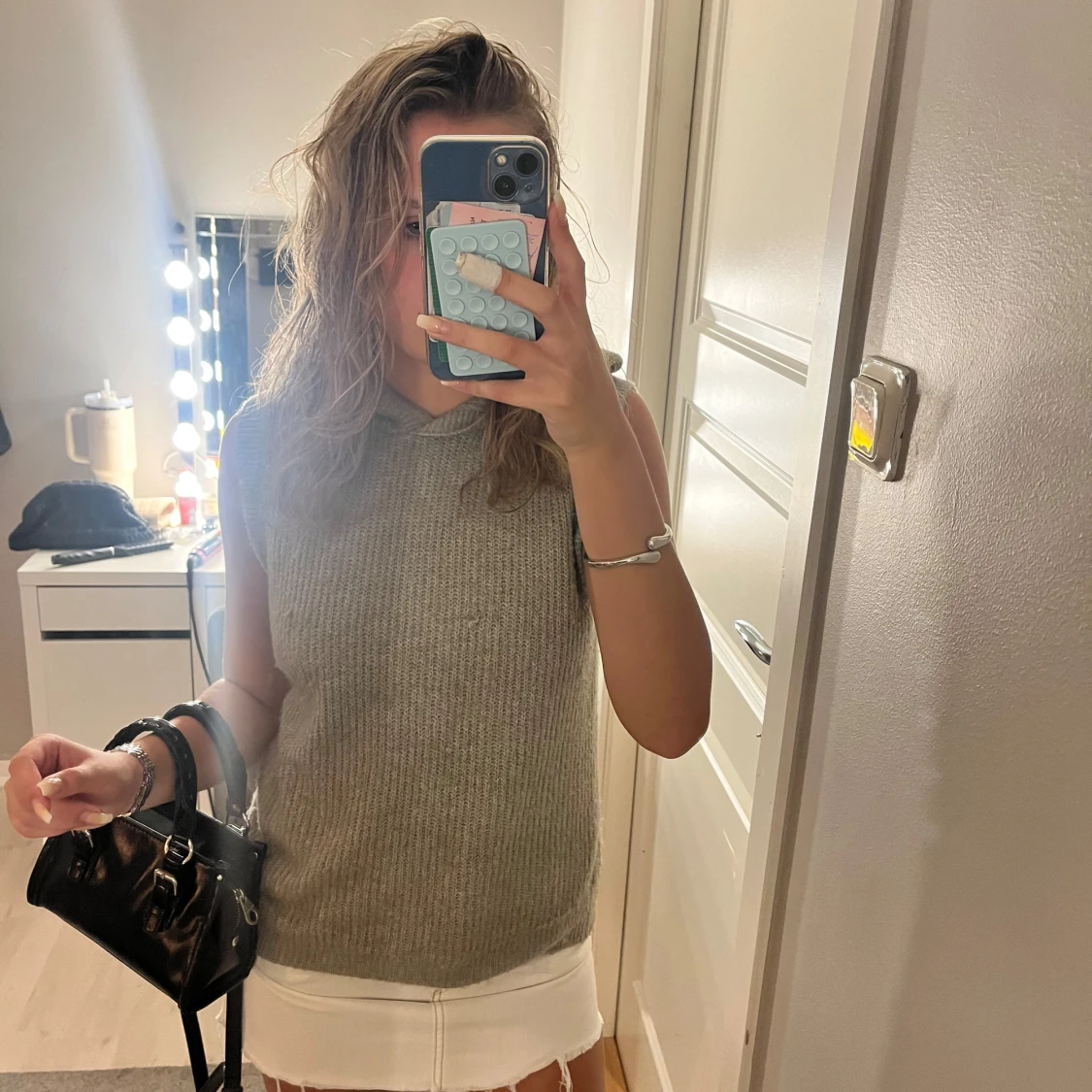 Stickad ärmlös hoodie i ljus grön