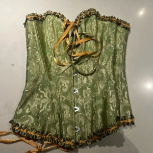 Korsett guld/grön - Korsett, grön och guld knyten, push up, xs