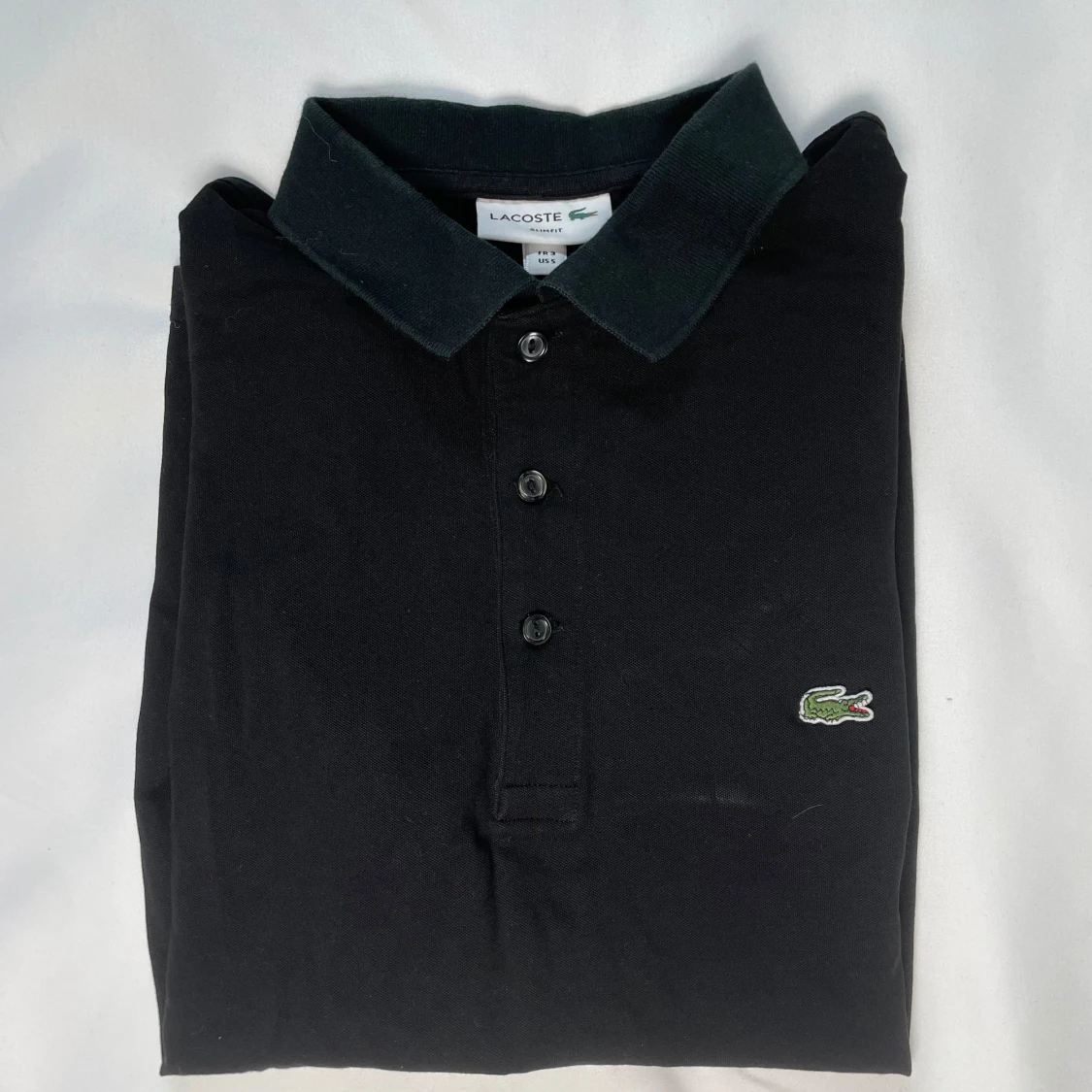 Svart pikétröja från Lacoste - 2